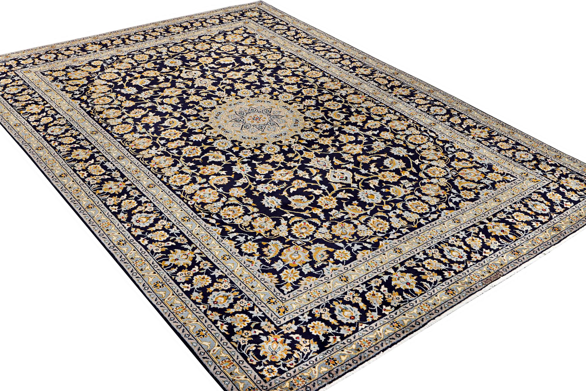 A Keshan carpet, c. 365 x 259 cm.