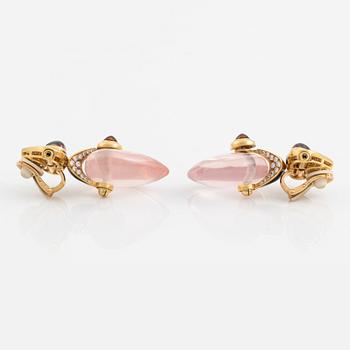 A pair of Marina B earrings.
