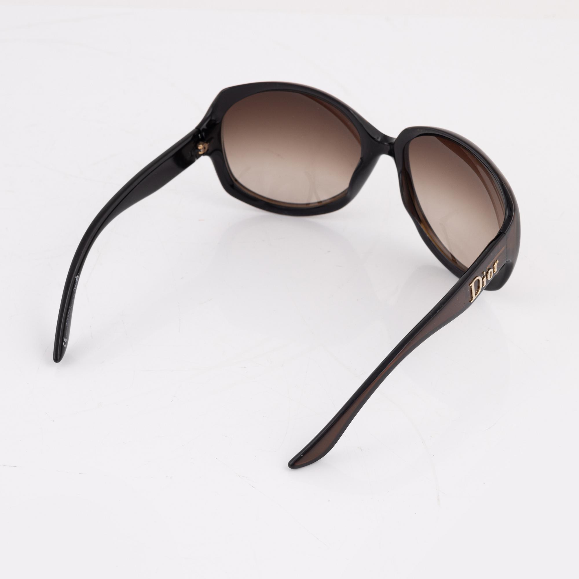 Christian Dior a pair of sunglasses Glossy 1