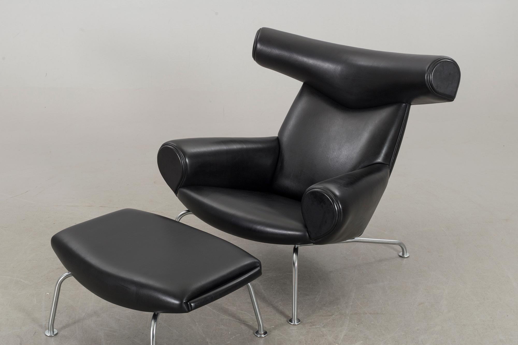 HANS J WEGNER, "Ox chair" lounge chair and stool.