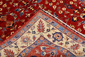 A rug, Ziegler design, approx. 246 x 177 cm.