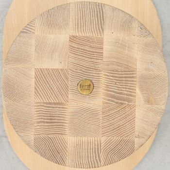 An 'Insert' side table, Firm Living.