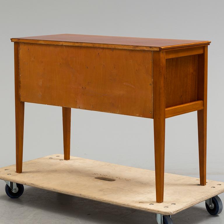 A 1960s teak veneered sideboard.