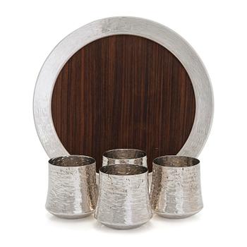 Tapio Wirkkala, four silver beakers, and a rosewood and sterling silver tray, Kultakeskus, Hämeenlinna 1973-74.
