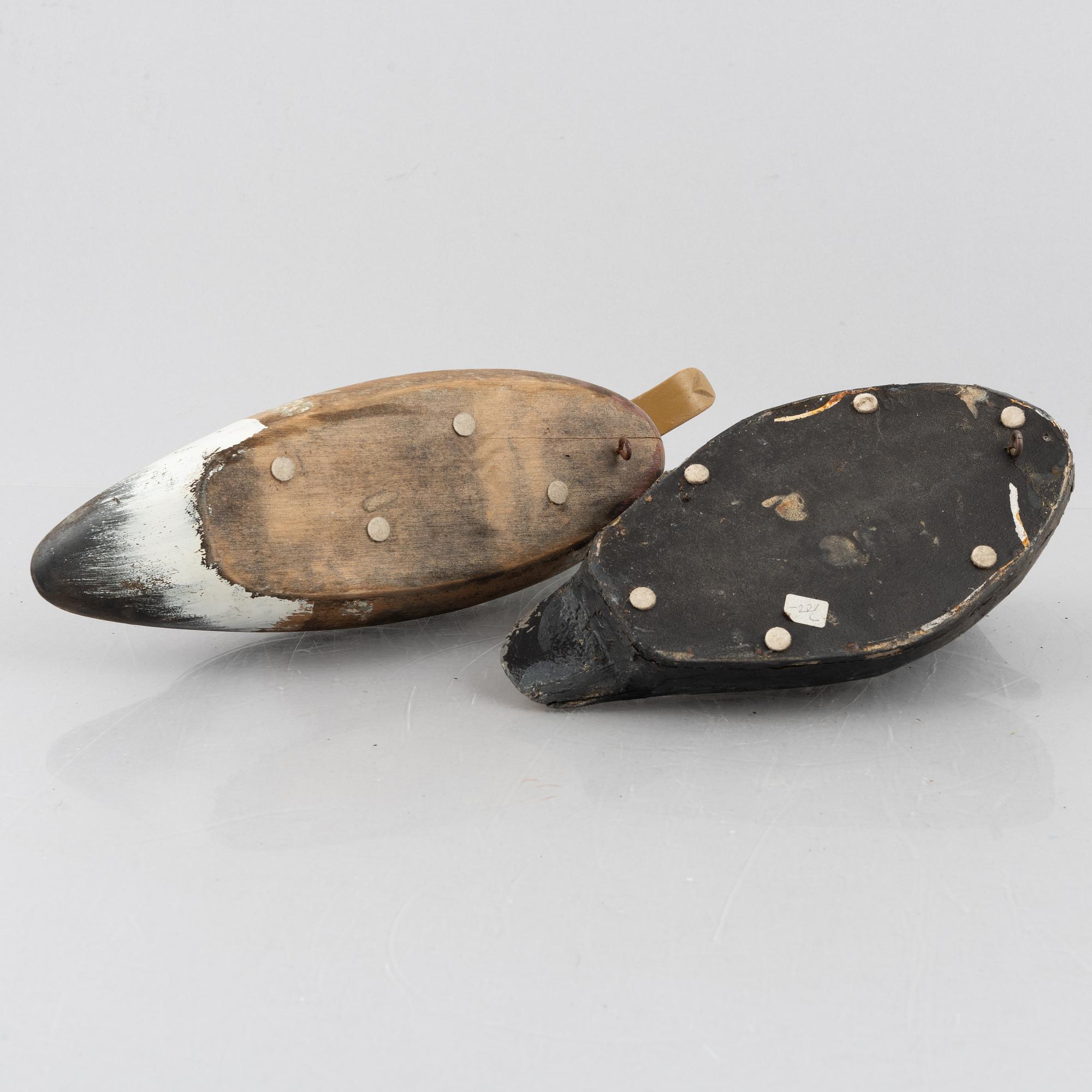 A set of six wooden duck decoys, 20th century.