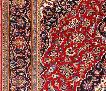 A Kashan carpet, approximately 315 x 200 cm.