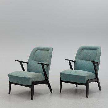 A pair of mid 20th century easy chairs.