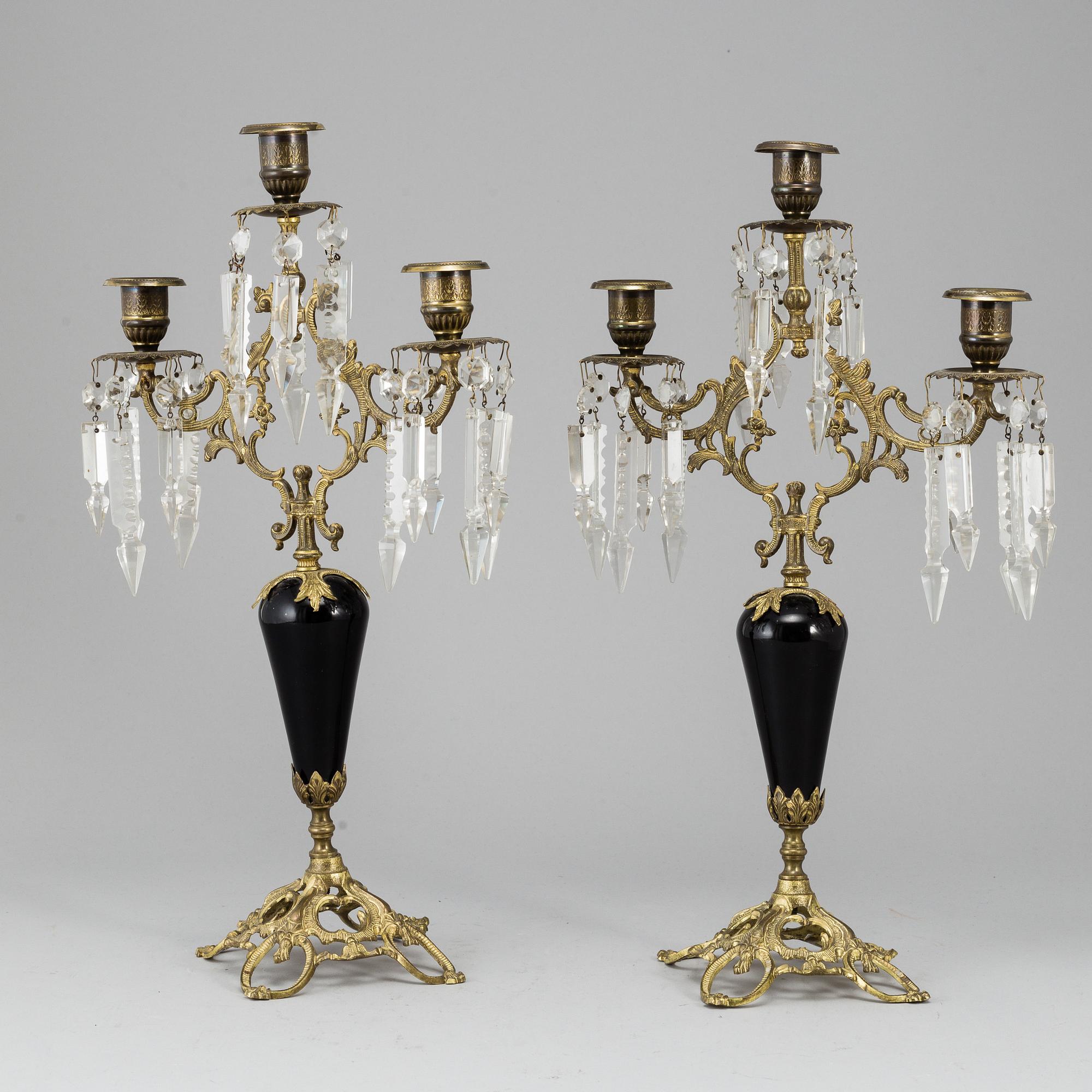 A pair of Victorian brass candelabra from around year 1900.