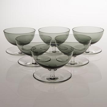 A set of six model 1344 footed glass dessert bowls from Nuutajärvi. Designed in 1952.