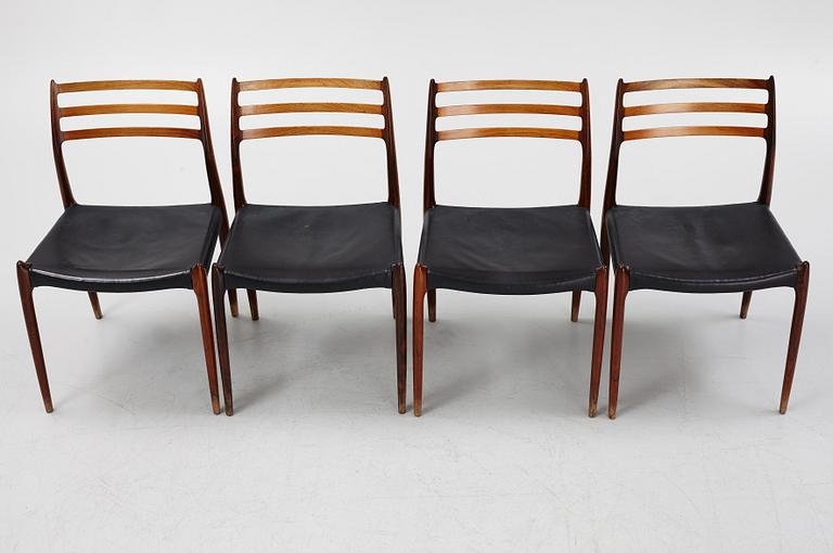 Niles Otto Møller, a rosewood veneered table with four chairs, JL Møller, Denmark, 1950's/60's.