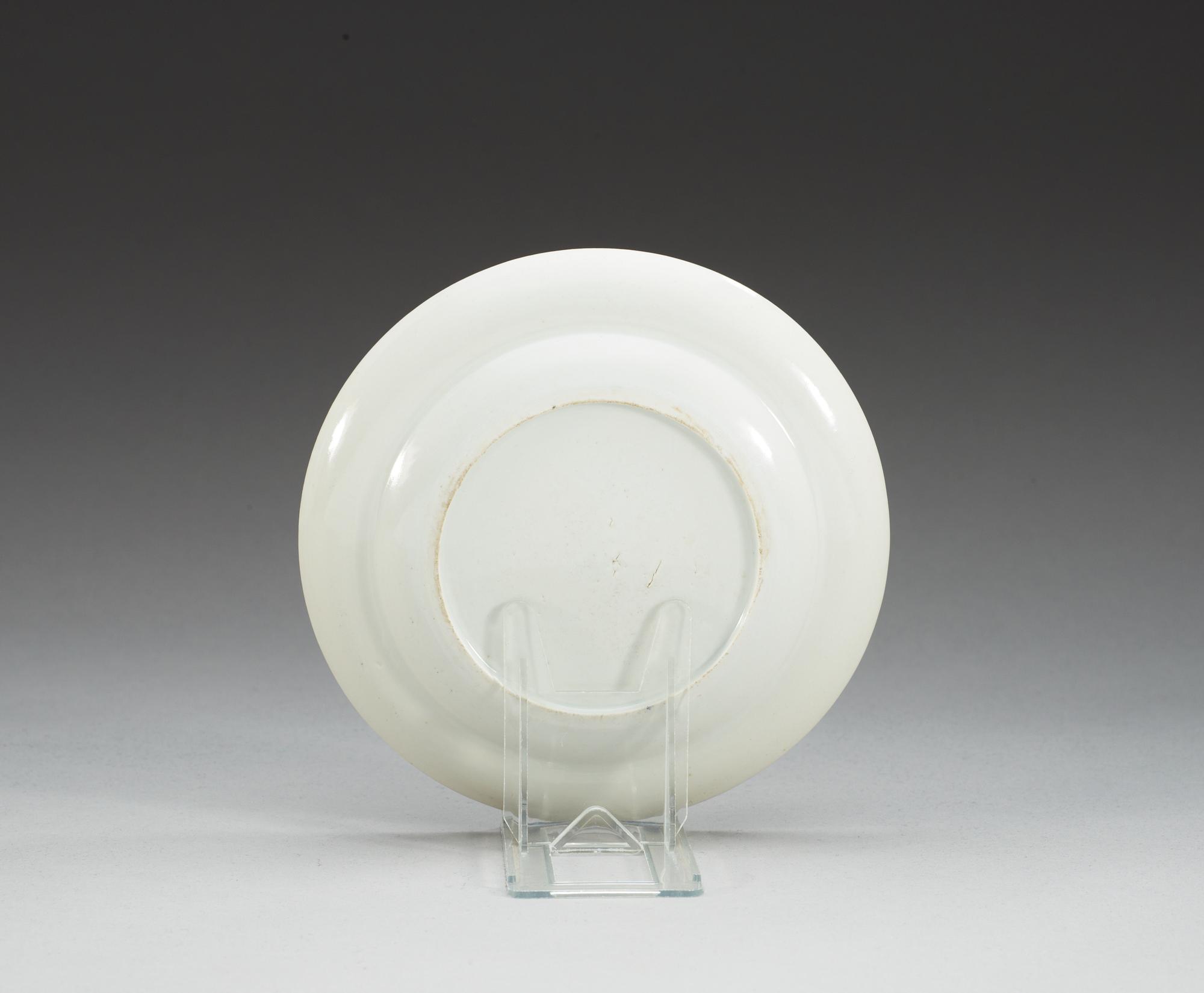A famille rose 'sample plate' with the monogram AJ, Qing dynasty, Jiaqing (1796-1820).