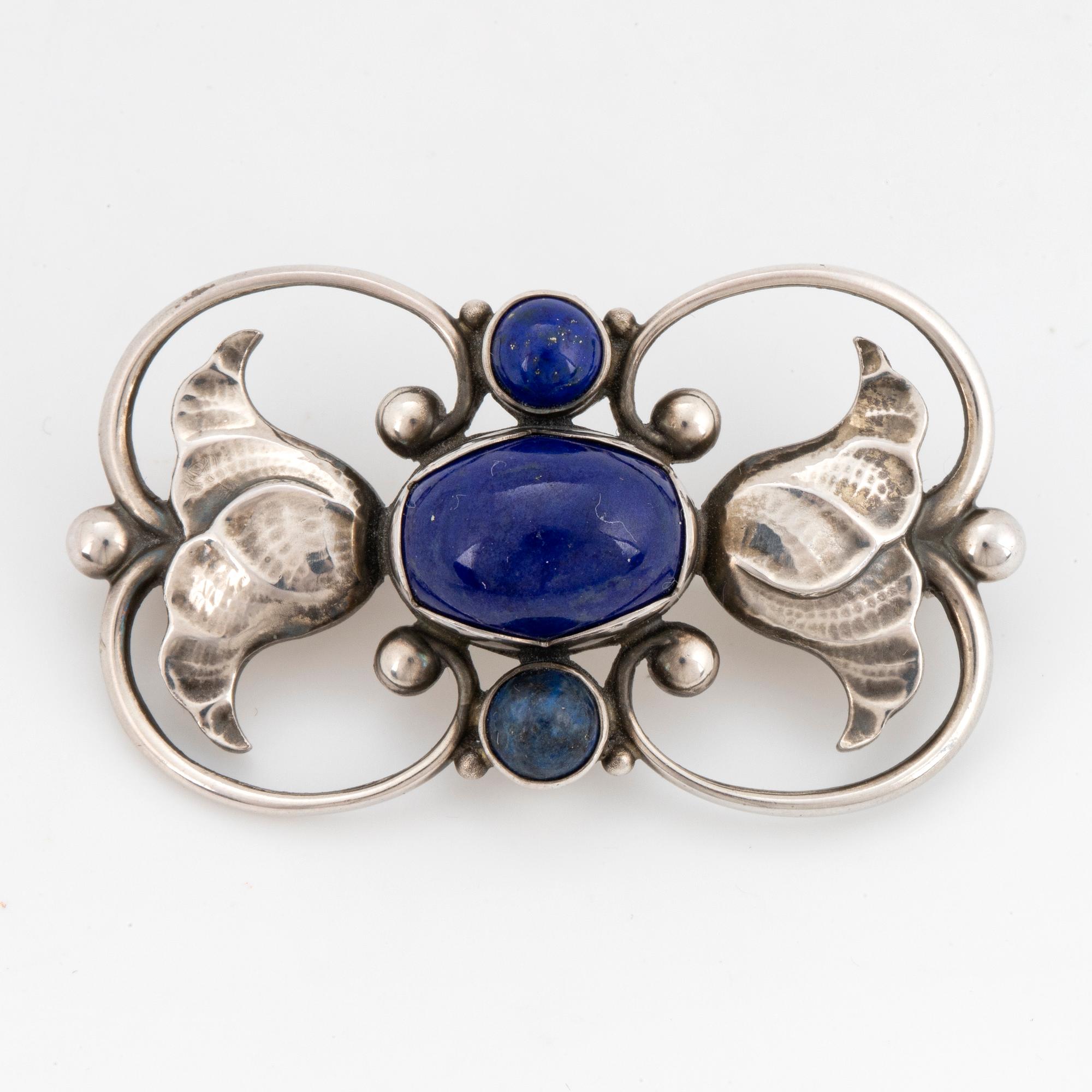 A Georg Jensen brooch 236A silver set with lapis lazuli.