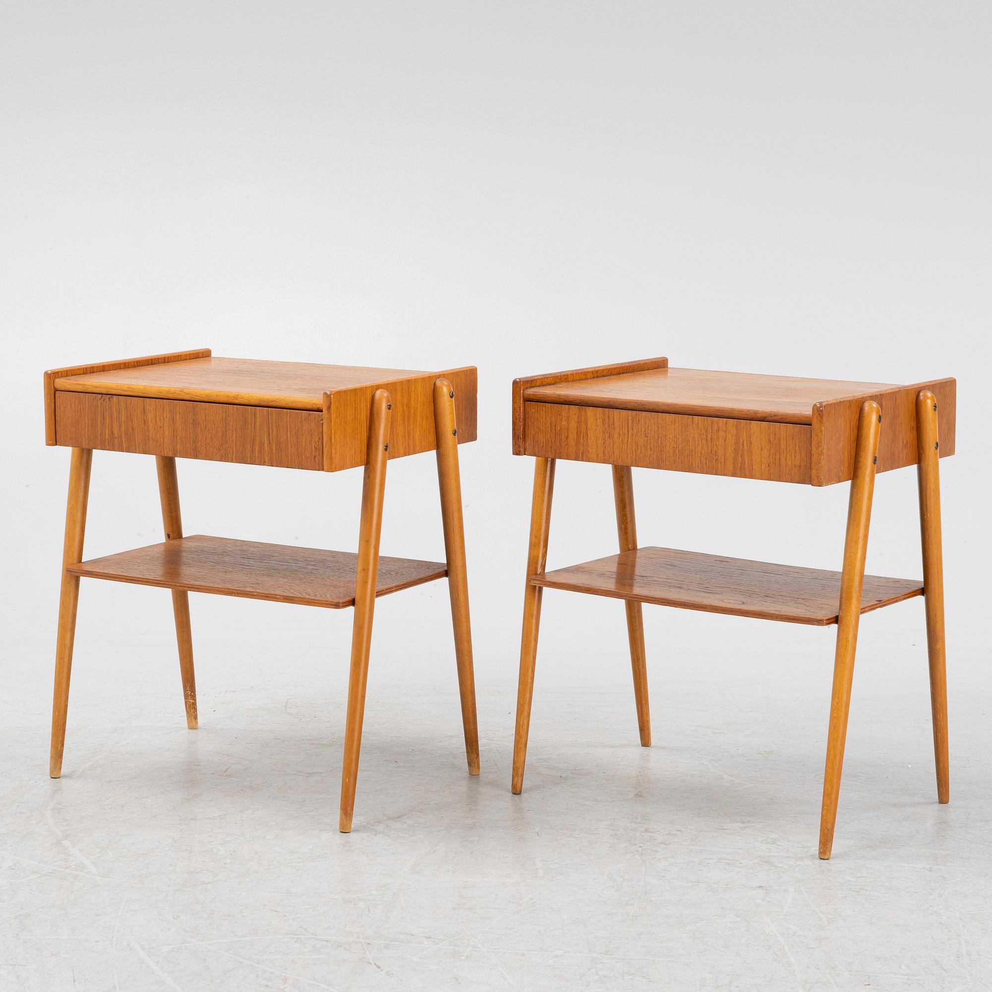 A pair of teak veneered bedside tables, 1960's.