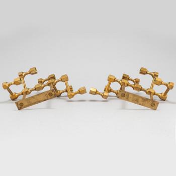 A pair of brass wall candelabras, for Gusum, signed BK and dated 1995 and 1997.