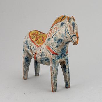 A wooden carved and painted 'Dalahäst', early 20th century.