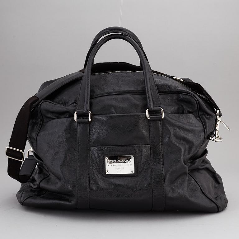 DOLCE & GABBANA, a black leather weekend bag, 2009.