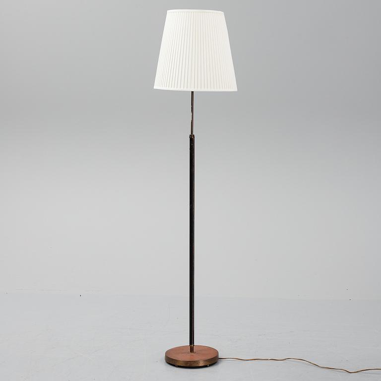 A '7071' floor lamp by Falkenbergs belysning.
