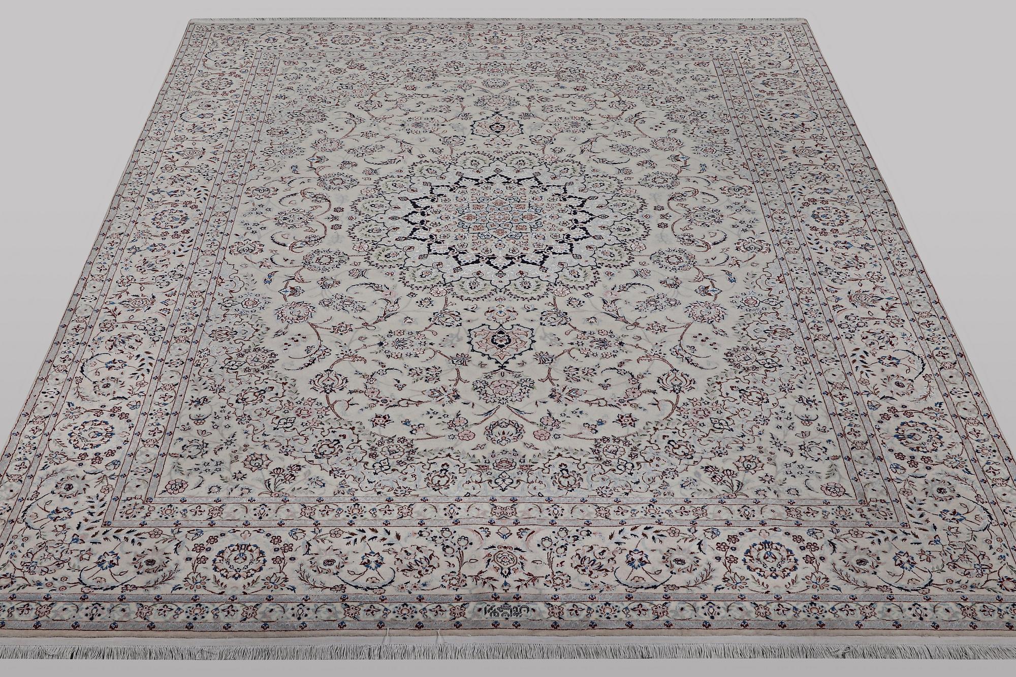 A carpet, Nain, part silk, ca 341 x 245 cm.