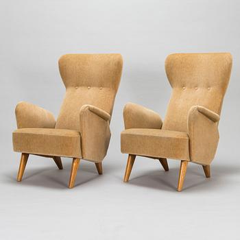 Carl Gustaf Hiort af Ornäs, a mid 1900's pair of armchairs for Hiort Tuote Puunveisto, Finland.