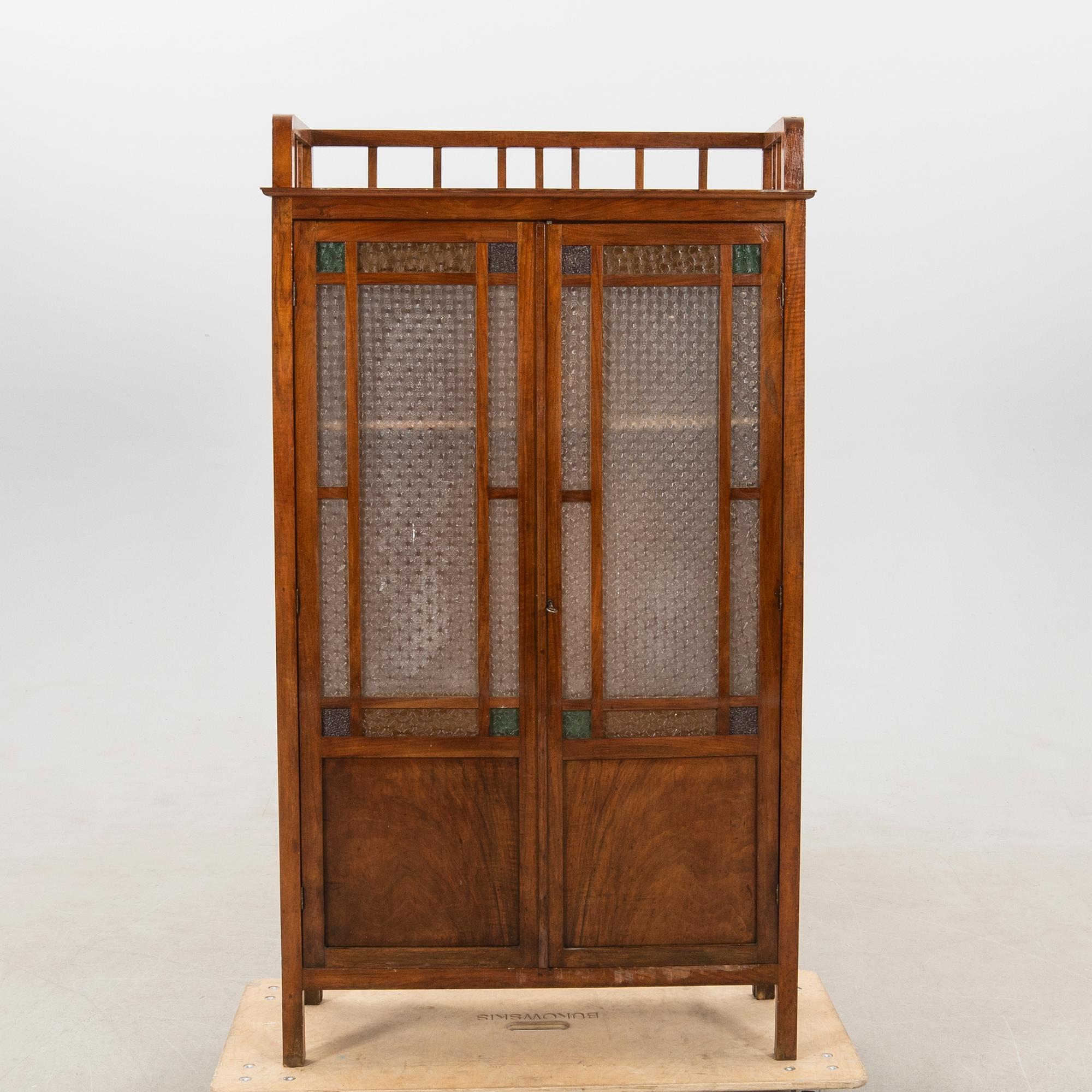 Cabinet, early 1900s.