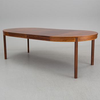 A rosewood dining table by Bertil Fridhagen for Bodafors.