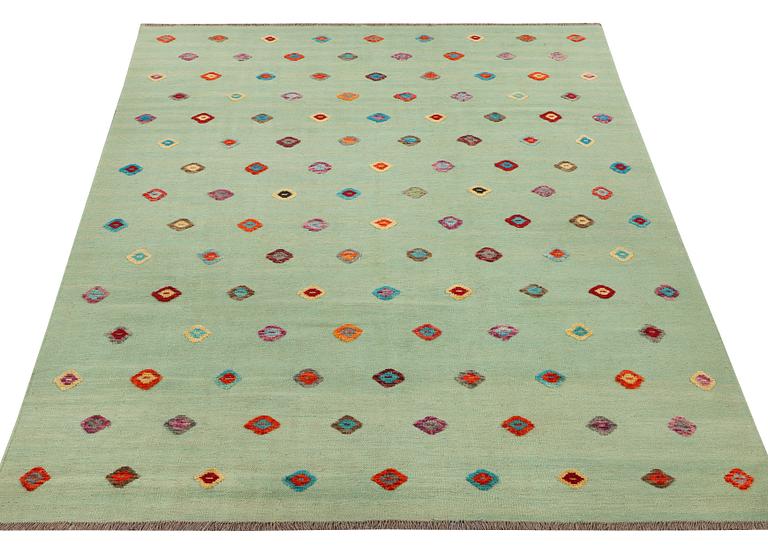 An Afghan kelim rug, c. 292 x 204 cm.
