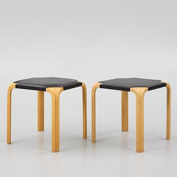 Alvar Aalto, a pair of 'X601' stool for Artek, later half of the 20th century.