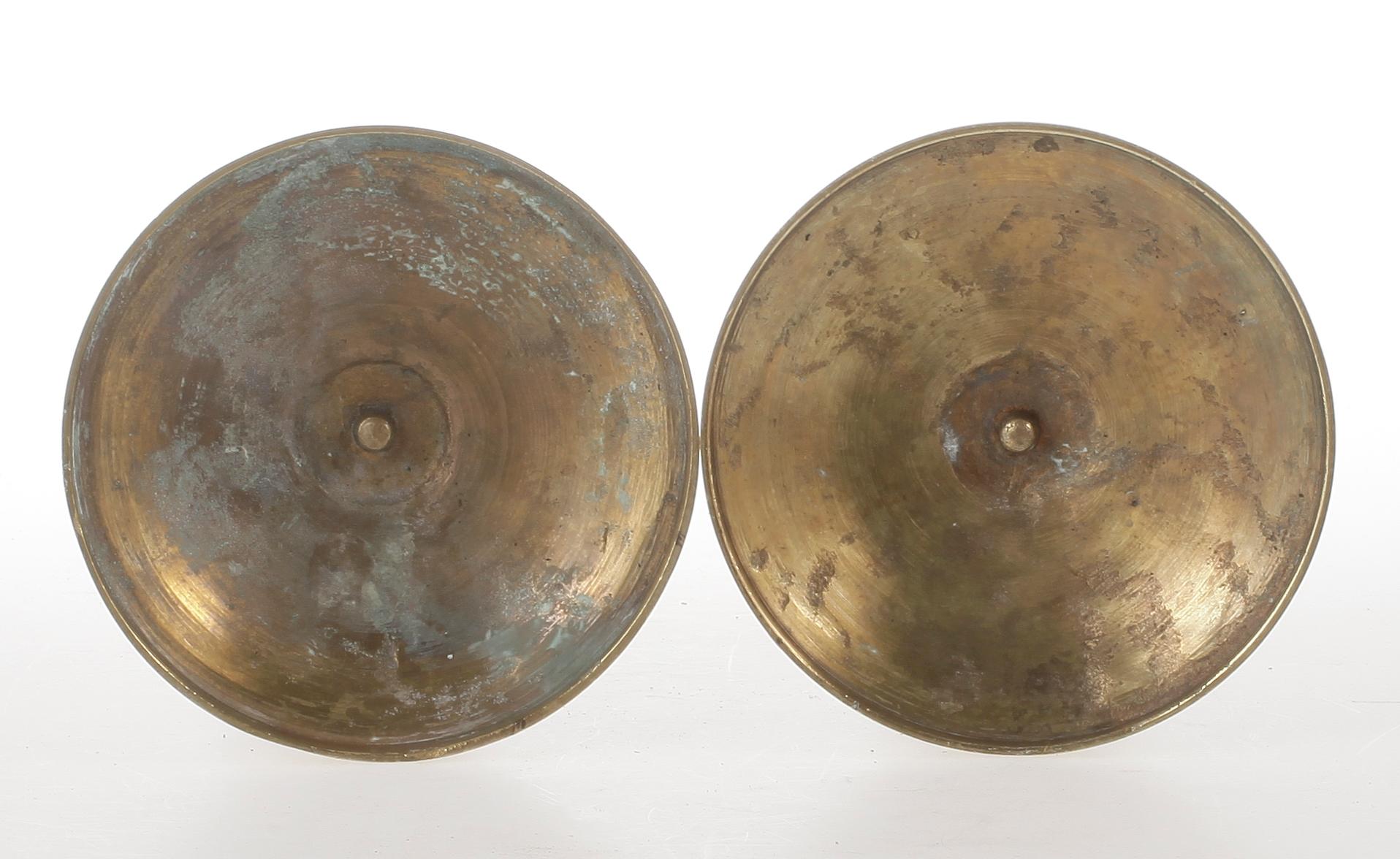 LJUSSTAKAR, ett par, mässing, senempire, 1800-talets första hälft/mitt.