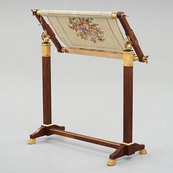 A French Empire early 19th century sewing stand.