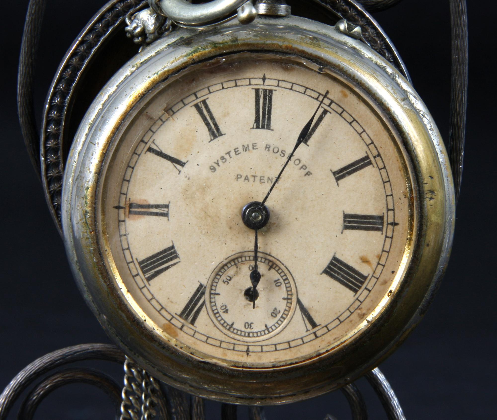 FICKUR MED STÄLL, vitmetall, 1900-talets början.
