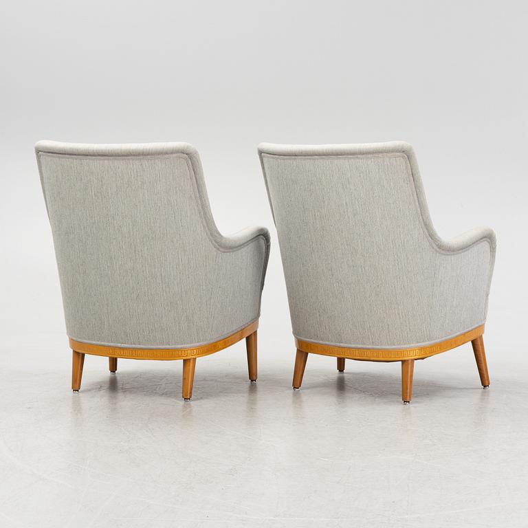 Carl Malmsten, attributed to. A pair of inlay easy chairs, mid 20th Century.