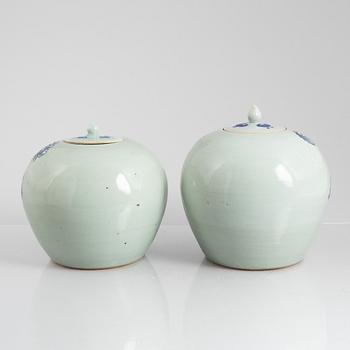 Two similar Chinese porcelain vases with covers, late 19th Century.
