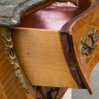 A Swedish rococo-style chest of drawers. Mid 20th century.
