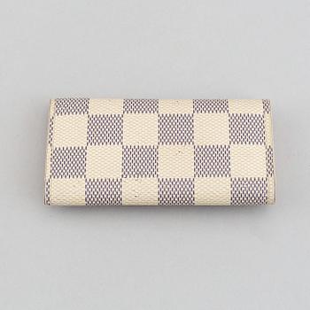 Louis Vuitton, neccessär samt nyckelhållare.