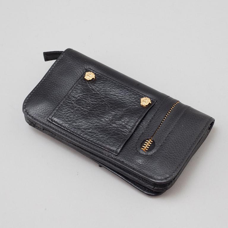 a VERSACE wallet.
