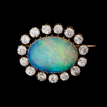 A BROOCH, opal, old cut diamonds, 18K gold.