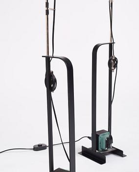 Achille Castiglioni, & Pier Castiglioni, a pair of "Toio" floor lamps, Flos, Italy, post 1963.