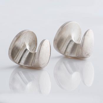 A pair of cufflink, by Ole Lynggaard.