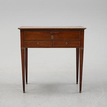 A late Gustavian mahogany tabld with drawers, end of the 18th Century.