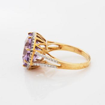 An amethyst ring.