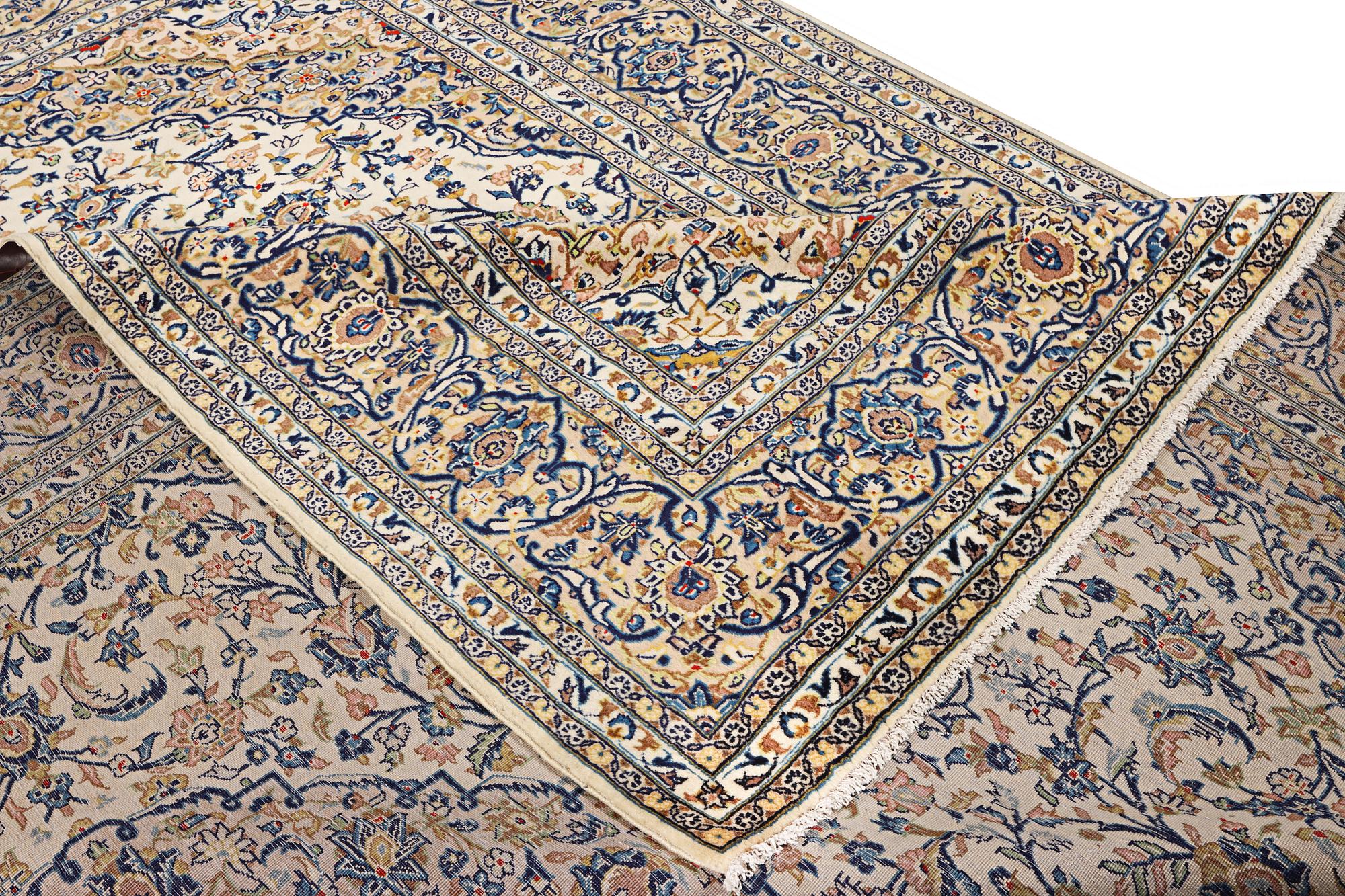 A Kashan rug, a. 250 x 242 cm.