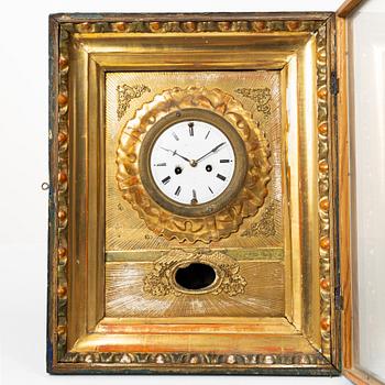 A wall clock. Germany, 19th Century.
