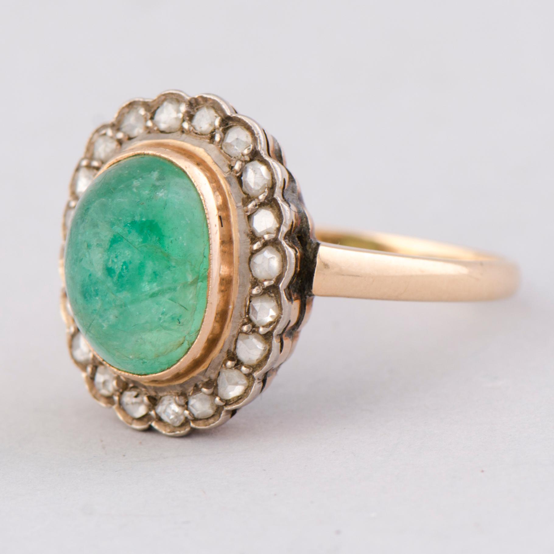 A RING, cabochon cut emerald, rose cut diamonds, 14K gold. Soviet.