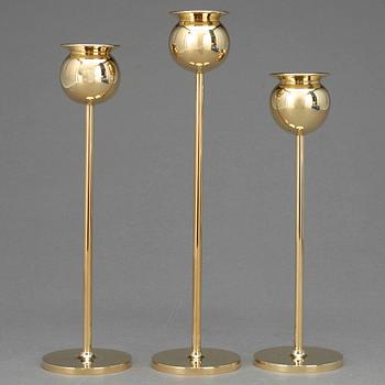 LJUSSTAKAR, 3 st, mässing. Pierre Forsell, Skultuna.