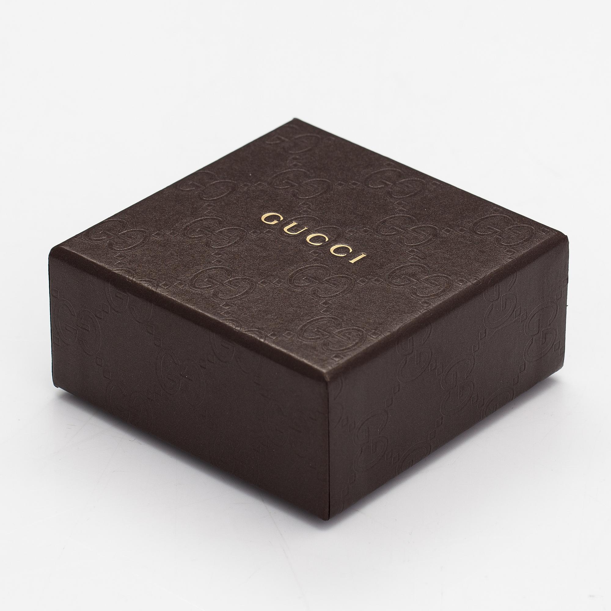 Gucci, A pair of earrings, bracelet, ring and necklace made of sterling silver. Marked Gucci, Made in Italy.