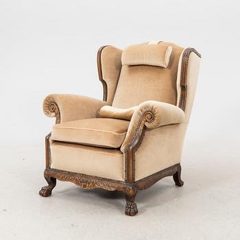A fabric upholstered easy chair from the second half of the 20th Century.
