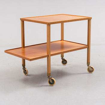 A mahogany veneer tea trolley designed in 1932 by Josef Frank for Firma Svenskt Tenn.