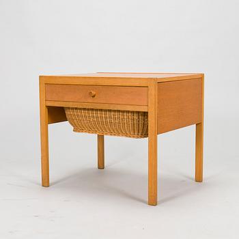 A mid-20th-century sewing table.