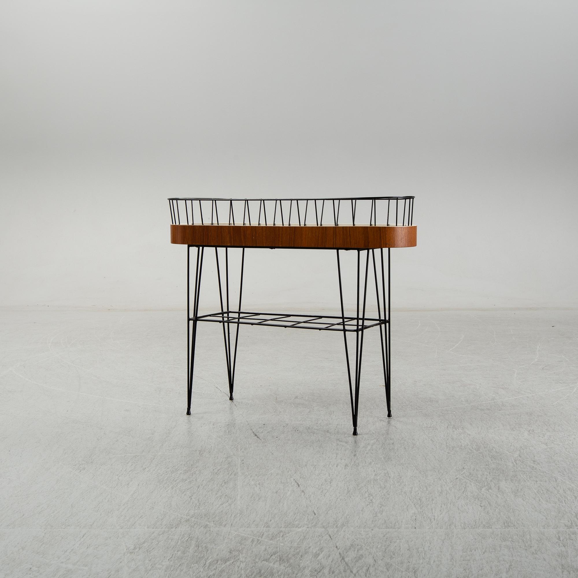 A 1950-60s plant stand.