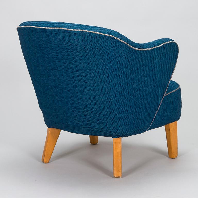 Flemming Lassen, an armchair manufactured by Asko 1952-1956.
